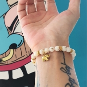 Bracelet « Elégance » en coquillage naturel - Charm éléphant doré