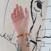 Bracelet "Energie & Vitalité" en cornaline - Perle éléphant doré