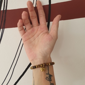 Bracelet "Protection" en œil de tigre - Charm éléphant doré