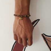 Bracelet "Protection" en œil de tigre - Charm éléphant doré